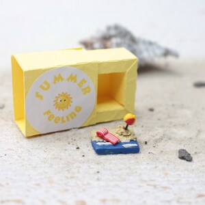 Summer to take away, summer in a 3 cm sliding box, holiday memory in your pocket, summer sun beach