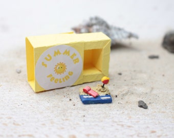 Summer to take away, summer in 3 cm sliding box, holiday memory in your pocket, summer sun beach