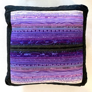 Wouldn't this royal purple pillow add a decorative accent to your sofa or bedroom.  Handmade throw cushion for your home or office decor.