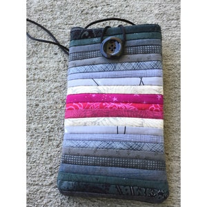 Quilted phone case with strap. 4 by 6.75 inches. Cross shoulder soft i-phone case pieced in grey with pink accent. Free shipping. Gift.