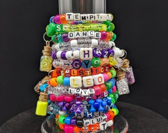 14 Assorted Kandi Charm Bracelets – UV, Glow, Glitter, Rainbow (14)