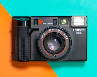 Canon AF35ML Super Sure Shot Point and Shoot Cámara de película de 35 mm con lente Canon 40 mm 1:1.9 Prime - Probada profesionalmente / en funcionamiento