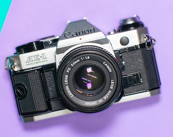 ほぼ新品のブラック Canon FTb QL SLR 35 mm フィルム カメラ +
