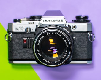 Olympus OM10 35mm Film Camera with Olympus OM-System G. Zuiko 50mm 1:1.4 Prime Lens - Professionally Tested / Working