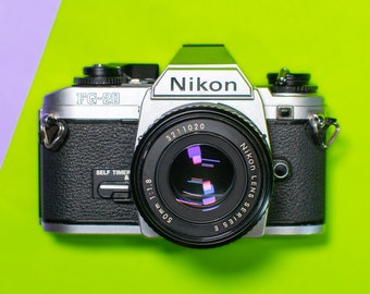 Nikon FG-20 35mm Film Camera with Nikon Series E 50mm 1:1.8 Pancake Lens - Professionally Tested / Working