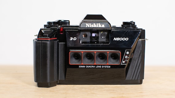 Nishika N8000 3D Point and Shoot 35mm Film Camera With Nishika N8000 3D Point and Shoot 35mm Film Camera With