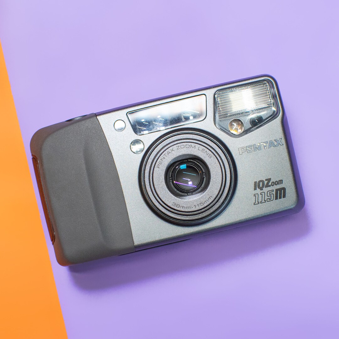 Pentax Iqzoom 115M Point and Shoot 35mm Film Camera With Canon 38115mm