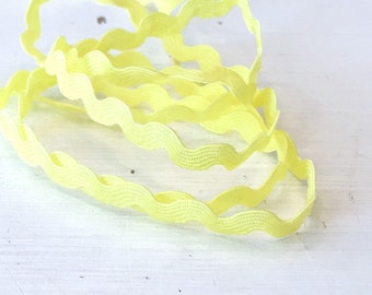 Tresse irrégulière jaune 8 mm à 1 m