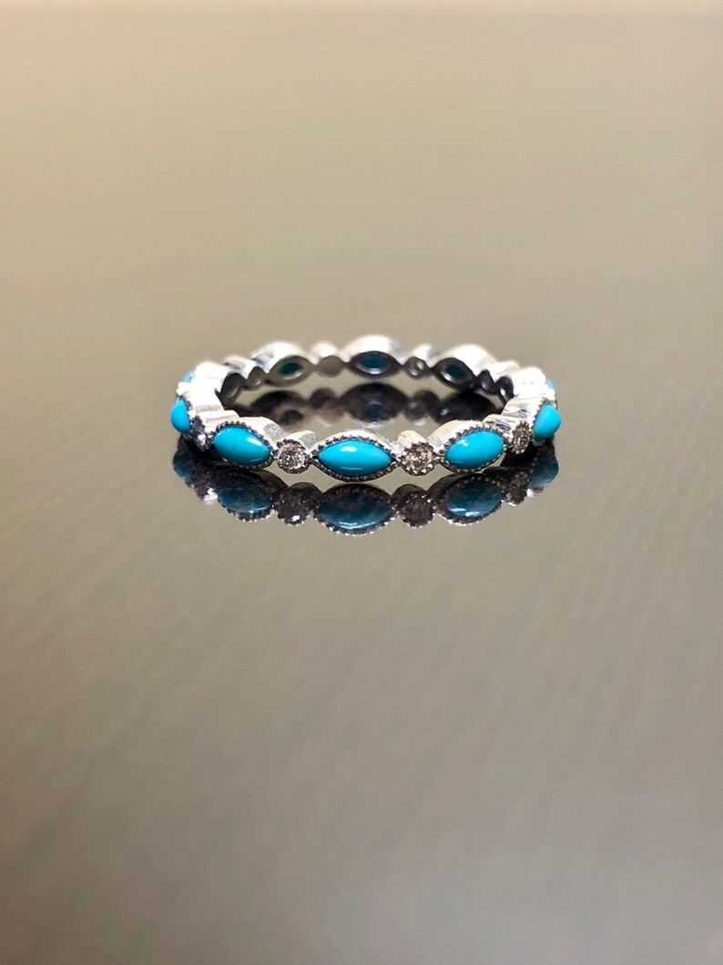 Eye of the Sun Sterling Silver Ring plated in Platinum with Turquoise Enamel (No 54)
