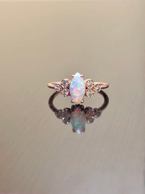 bezel set opal engagement ring