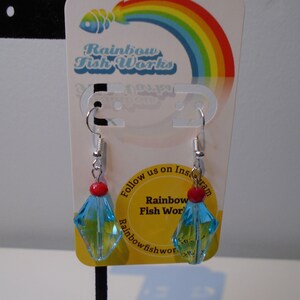 Clear Blue Faceted Bead with Red Accent Dangle Earrings