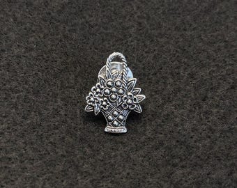 Broche vintage de cesta de flores plateada de "Avon" - década de 1980