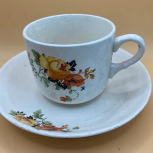 Vintage Homer Laughlin tea cup and saucer rose pattern