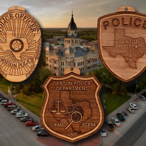 May include: Three wooden ornaments featuring the Denton Police Department logo. The first ornament is a traditional police badge with the words "Police Officer" and "Denton Police" around the edge. The second ornament is a shield with the word "Police" at the top and "Denton Texas" inside. The third ornament is a shield with the words "Denton Police Department" at the top and "Crime Scene Unit" at the bottom.