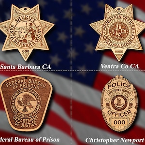 May include: Four wooden engraved badges with different designs. The top left badge is a star-shaped sheriff's badge with the text "SHERIFF SANTA BARBARA CO 000". The top right badge is a star-shaped probation officer badge with the text "PROBATION OFFICER VENTURA COUNTY 0000". The bottom left badge is a shield-shaped federal bureau of prisons badge with the text "FEDERAL BUREAU OF PRISONS DEPARTMENT OF JUSTICE". The bottom right badge is a round police officer badge with the text "POLICE CHRISTOPHER NEWPORT OFFICER 000".