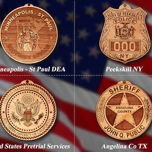 May include: Four wooden ornaments featuring different law enforcement agency logos. The top left ornament features the Minneapolis-St. Paul DEA logo, the top right ornament features the Peekskill NY Police logo, the bottom left ornament features the United States Pretrial Services logo, and the bottom right ornament features the Angelina County Sheriff's logo.