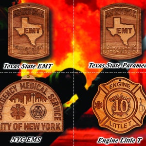 May include: Four wooden ornaments featuring different emergency services logos. The top left ornament is a Texas State EMT badge, the top right is a Texas State Paramedic badge, the bottom left is a City of New York EMS badge, and the bottom right is an Engine Little T fire department badge.