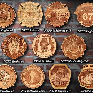 May include: A collection of nine wooden plaques with various designs and text. The plaques feature the New York City Fire Department (FDNY) logo, including engine and ladder numbers, and other designs such as a veteran's badge, a hockey team logo, and a public building unit logo. The plaques are all made of wood and have a natural finish.