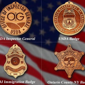 May include: Four wooden badges with different designs. The top left badge is round and says "Office of Inspector General USDA". The top right badge is round and says "United States Department of Agriculture Special Agent". The bottom left badge is a shield shape and says "US Immigration Special Agent 000". The bottom right badge is a six-pointed star and says "Sheriff Ontario County New York".