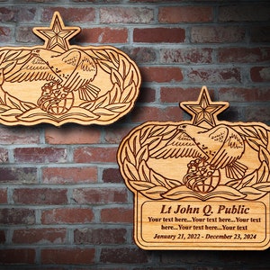May include: A wooden plaque with a laser-engraved Air Force Space and Missile badge. The plaque features a laurel wreath, a globe, and a falcon carrying a wreath. The text "Lt John Q. Public" is engraved below the badge, along with the dates "January 21, 2022 - December 23, 2024".