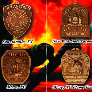 May include: Four wooden ornaments with fire department and paramedic emblems. The ornaments feature the text "San Antonio Fire Dept", "New York State Paramedic", "Micro Fire Dept", and "Micro, NC Flame Tamers". Each ornament has a hole for hanging.