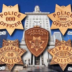 May include: Five wooden police badges with different ranks, including Officer, Sergeant, and Captain. The badges are all in the shape of a star and feature the words "Oakland Police" and "California".