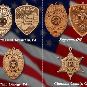 May include: Four wooden police badges with different designs and text. The badges are in the shape of a shield, star, and a traditional police badge. The text on the badges includes the names of the police departments, the state, and the city or town.