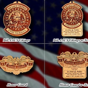 May include: Four wooden ornaments with different designs. The top left ornament is a round wooden plaque with a Viking warrior design and the text "960 AACS VIKINGS" and "UNTIL VALHALLA". The top right ornament is the same design as the top left ornament but with the addition of a text box with the text "Lt John Q. Public" and "January 21, 2022 - December 23, 2024". The bottom left ornament is a wooden plaque with an eagle design and the text "HONOR GUARD". The bottom right ornament is the same design as the bottom left ornament but with the addition of a text box with the text "Lt John Q. Public" and "January 21, 2022 - December 23, 2024".