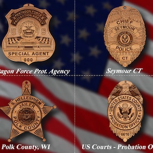 May include: Four wooden badges with different designs and text. The badges are in the shape of a star, shield, and oval. The text on the badges includes "Pentagon Force Protection Agency", "Seymour CT Police", "Polk County Jailer", and "US Courts Probation Officer".