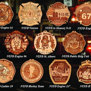 May include: A collection of ten wooden ornaments featuring the New York City Fire Department (FDNY) logo. The ornaments are decorated with various designs, including the FDNY logo, the words "FDNY", and the numbers of different firehouses. The ornaments are all made of wood and have a rustic, hand-crafted look.
