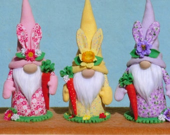 Patrón E de gnomos conejitos en la hierba