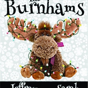 May include: A brown moose plush toy with a pink bow is decorated with colorful Christmas lights. The text "The Burnhams" is at the top of the image and the names "Jeffrey Dominic Lilly Jaxson Sarah" are at the bottom.