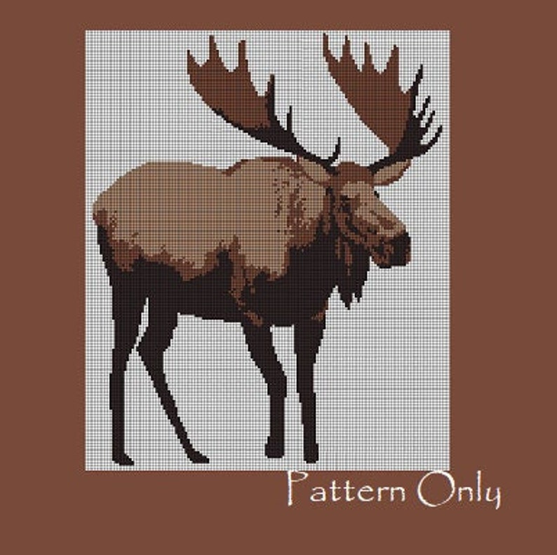 May include: Cross stitch pattern of a brown moose with large antlers. The moose is standing on a white background. The text "Pattern Only" is at the bottom of the image.