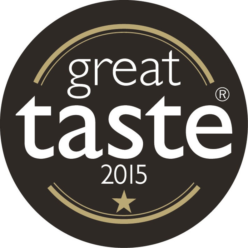 May include: A black and gold Great Taste award logo with the text "great taste" in white and the year "2015" below. A gold star is centered below the year.