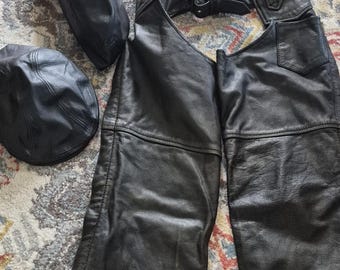 Leather motorcycle chaps and 2 hats