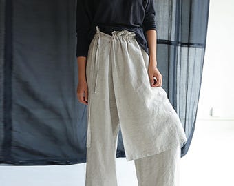 D097---取り外し可能なエプロン付きワイドレッグフラックスリネンプリーツパンツ、ワイドレッグリラックスリネンパンツ、オーダーメイド。