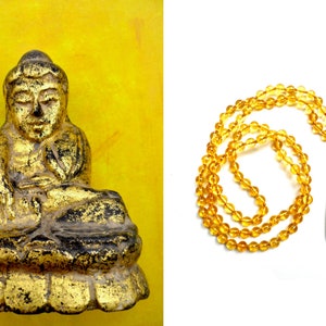 Handgeknoopte mala van 108 kralen Citrien  met amulet Boeddha , Thailand