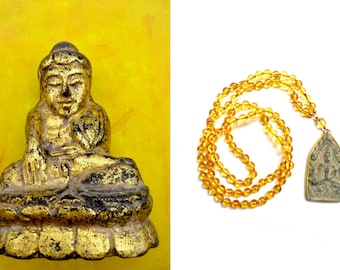Handgeknoopte mala van 108 kralen Citrien  met amulet Boeddha , Thailand