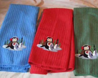 Christmas Penguins tea towel, One each red, green and blue.