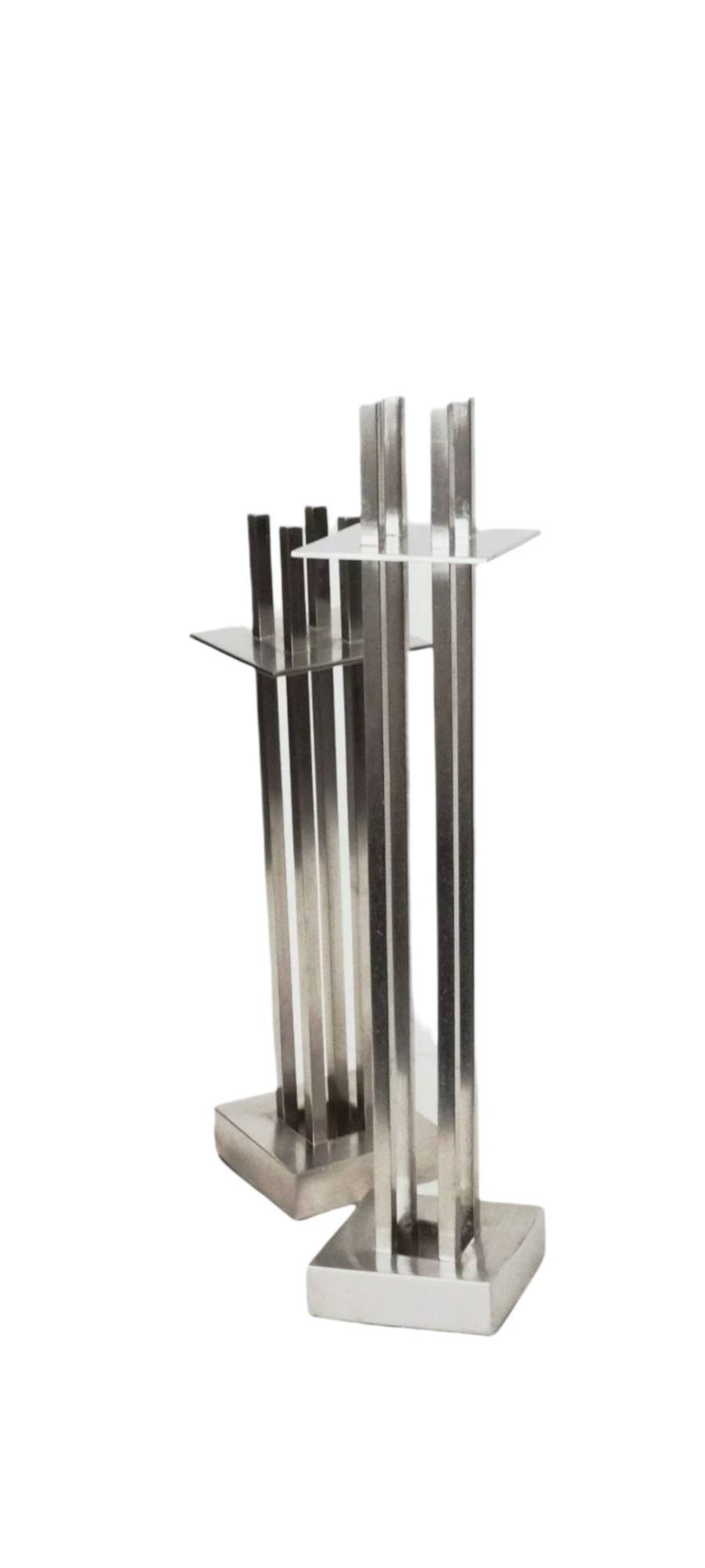 A PAIR OF RICHARD MEIER FOR SWID POWELL CANDLESTICKS. - Apr 18, 2015