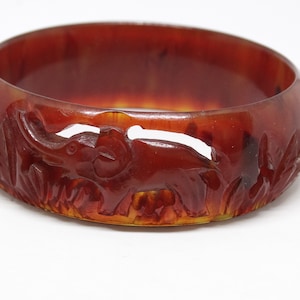 French Art Deco Carved Galalith Elephant Bangle 1 Inch Hand Carved Pierced Galalith Bracelet