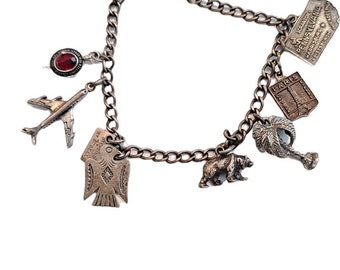Bracciale con ciondolo turistico souvenir anni '60 con ciondoli in argento sterling California Paris Thunderbird Palm Tree