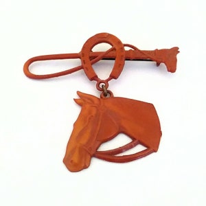 1950s Novelty Plastic Dangling Horse and Whip Brooch Western Brooch