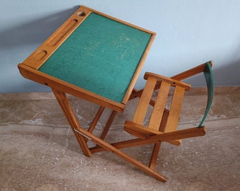Charming vintage child's school desk dating back to the 1950s, flip-top desk with chalkboard underneath