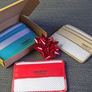 Fire hose Cardholder with a total of five lined pockets, two card slots each side and one central slip compartment for banknotes - Obgetti