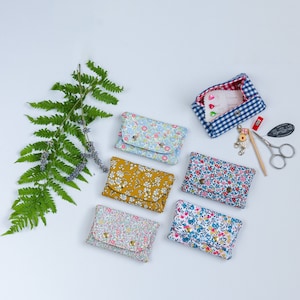 Pequeña bolsa para nociones, monedas o cualquier otra cosa pequeña que tengas que llevar contigo en un espacio pequeño, perfecta para deslizar en un bolsillo