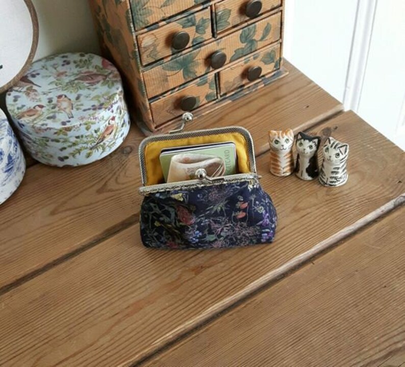 Coin purse made with Mauvey print Liberty Tana Lawn, a golden lining, and a hand stitched bronze colour metal frame image 5