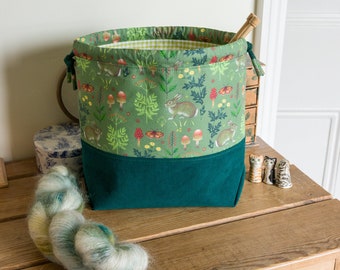 Drawstring project bag made with woodland bunny fabric, corduroy and a toning gingham lining. Perfect for any small craft project.