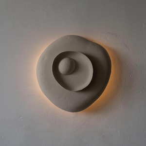 Organic wall sconce – sculptural white paper mâché lamp