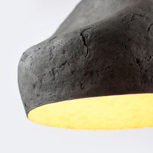detail of Paper Mache grey Light Sculpture Sensi for the dining room